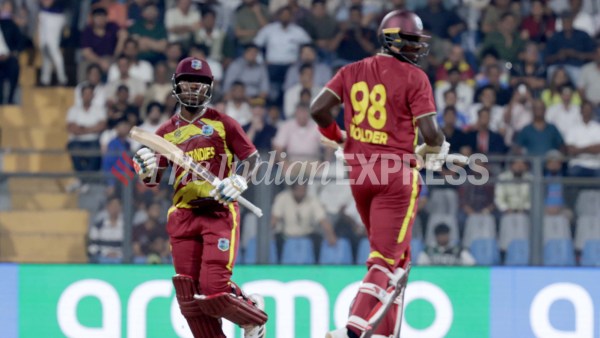 Sherfane Rutherford and Jason Holder added 61 runs in 32 balls for the sixth wicket vs England. (Express photo by Narendra Vaskar)