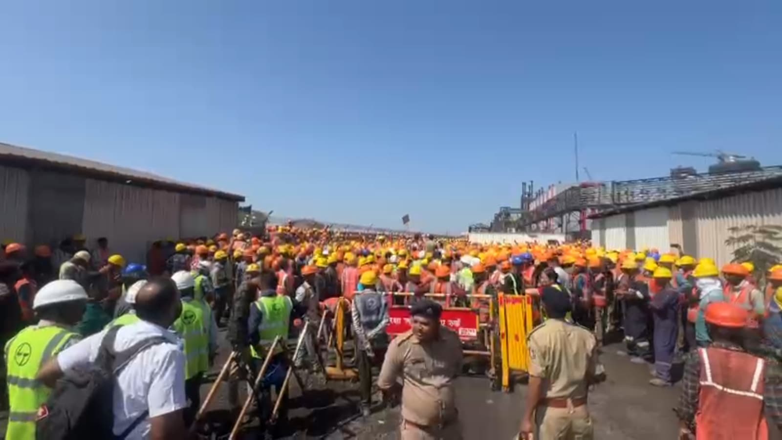 indianexpress.com - Express News Service - Surat: Workers' protest turns violent, cops fire tear gas shells