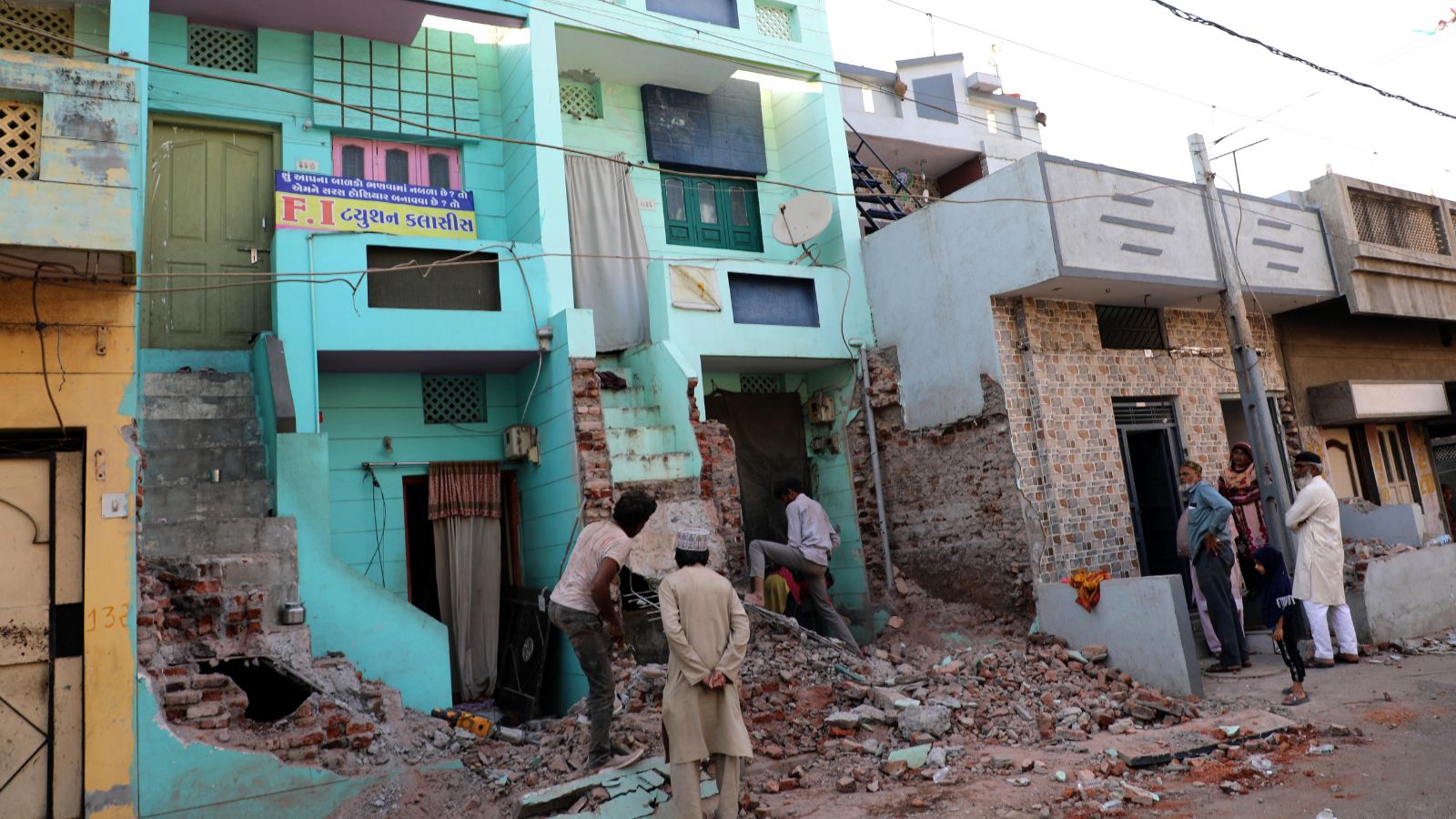 aji river, demolition, rajkot,