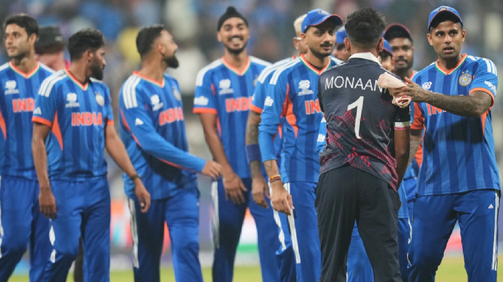  United States' captain Monank Patel shake. Hands with India's captain Suryakumar Yadav, right, after India won the T20 World Cup cricket match in Mumbai, India, Saturday, Feb. 7, 2026. (AP Photo)