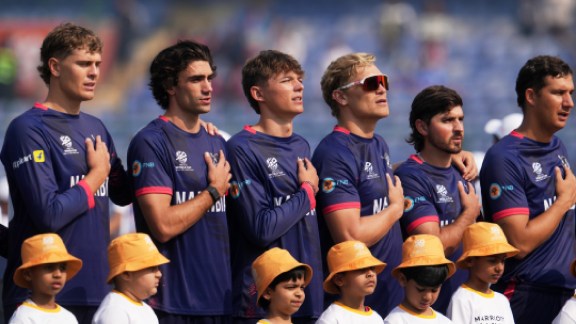 Namibia team stand for their national anthem during the T20 World Cup cricket match between Namibia and Netherlands in New Delhi, India, Tuesday, Feb. 10, 2026. (AP Photo)