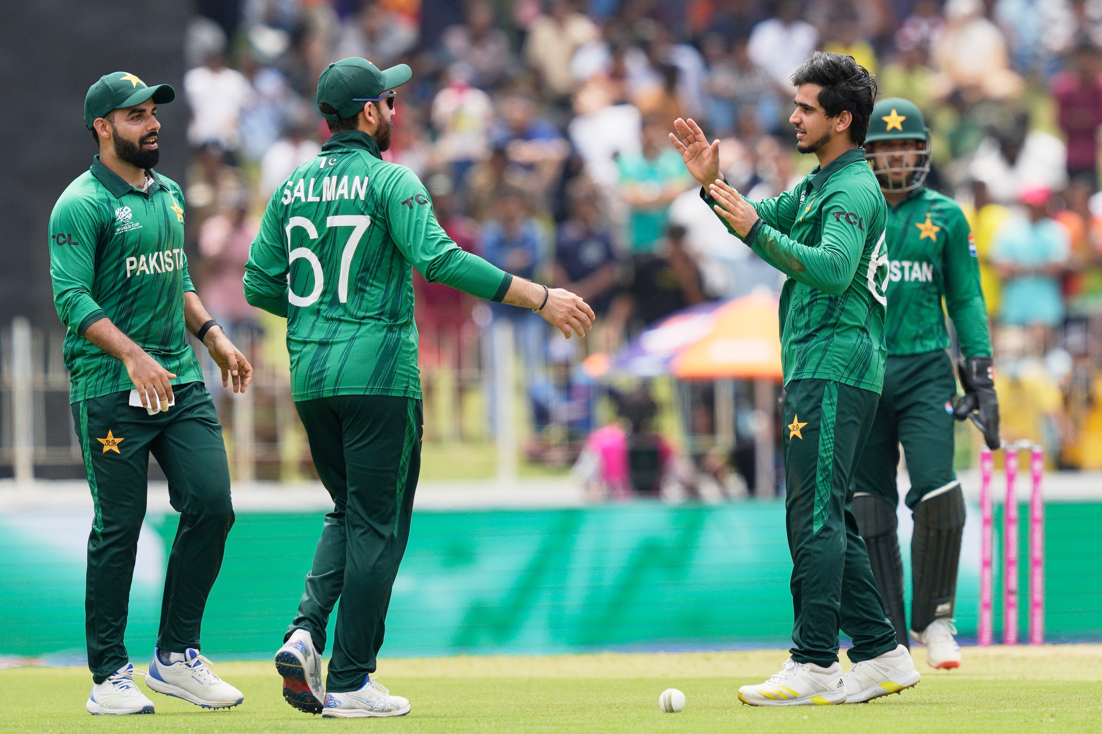 Pakistan's Saim Ayub, second right, celebrates with teammates the wicket of Netherlands' Zach Lion-Cachet during the T20 World Cup cricket match between Netherlands and Pakistan in Colombo, Sri Lanka, Saturday, Feb. 7, 2026. (AP Photo/Eranga Jayawardena)