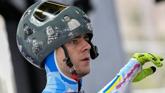 Ukraine's Vladyslav Heraskevych arrives at the finish during a men's skeleton training session at the 2026 Winter Olympics, in Cortina d'Ampezzo. (AP Photo)