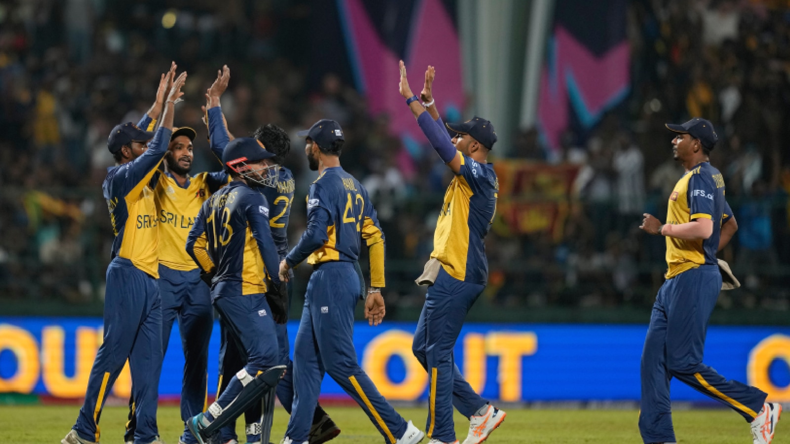 Sri Lanka's players celebrates the wicket of Australia's Tim David during the T20 World Cup cricket match between Sri Lanka and Australia in Pallekele, Sri Lanka, Monday, Feb. 16, 2026. (AP Photo)