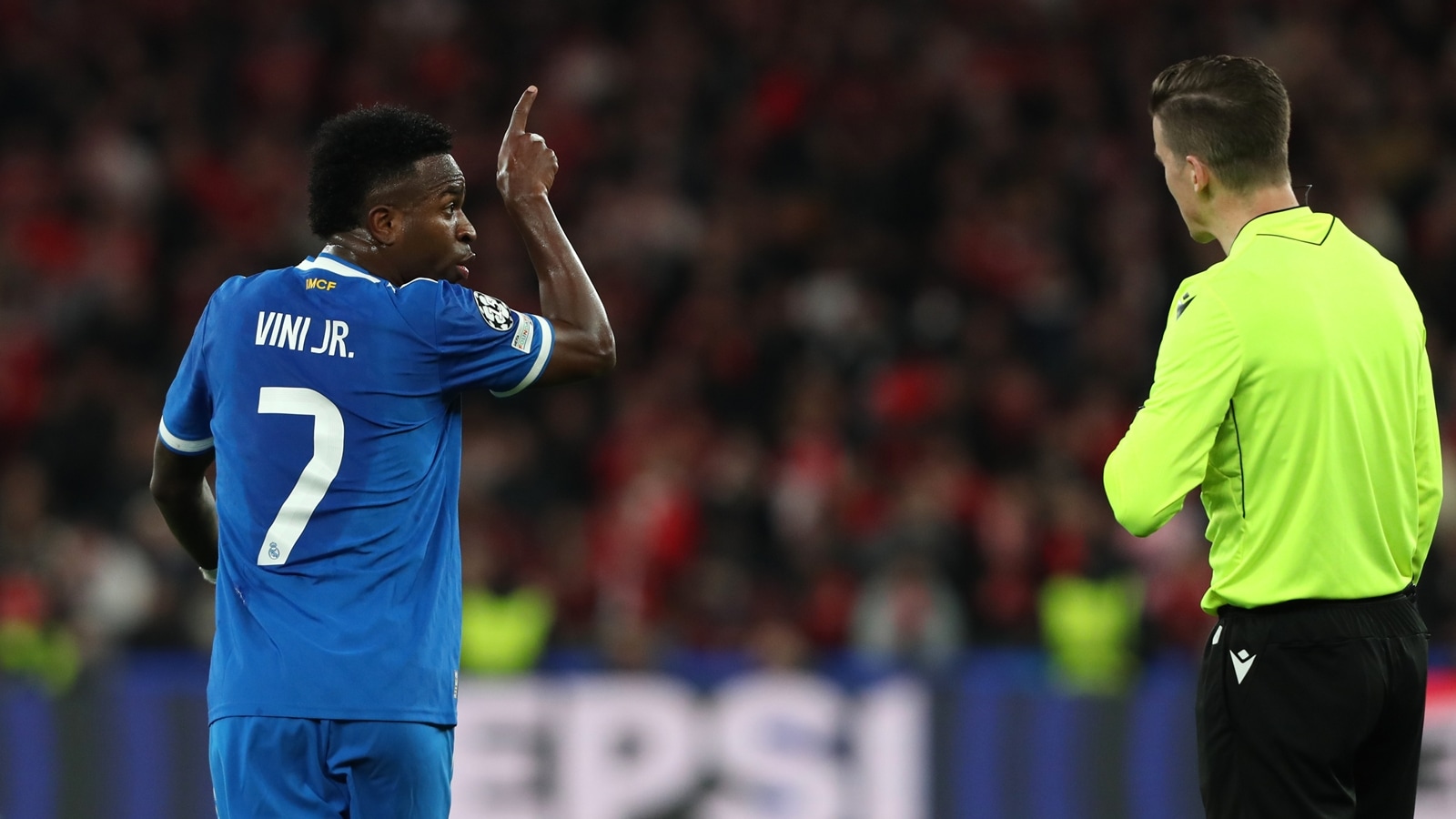 The atmosphere grew hostile after play resumed, with Vinicius and Mbappe loudly booed by the home crowd whenever they touched the ball. (AP Photo)