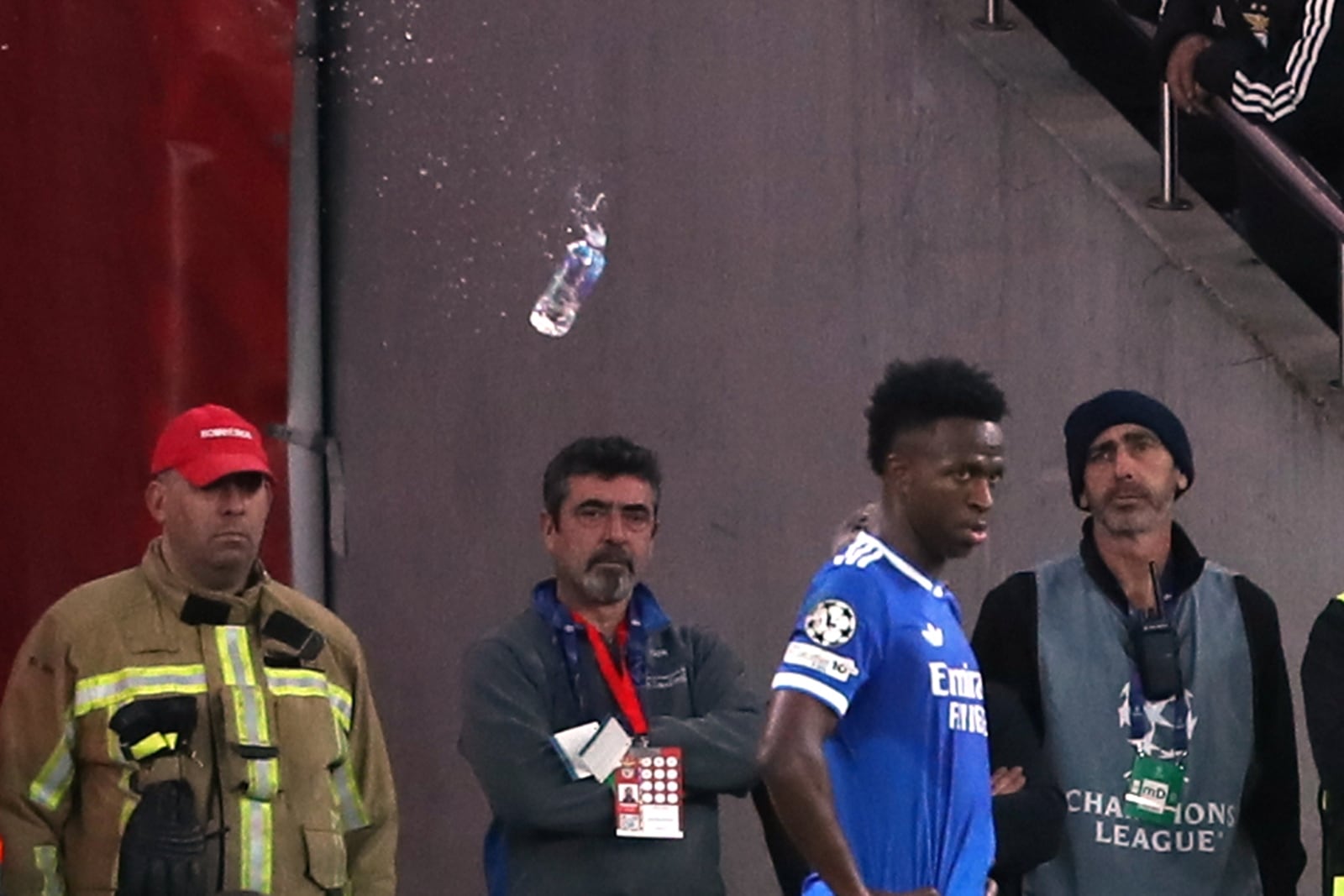 A bottle hit Vinicius when he was standing on the sideline during a corner. (AP Photo)