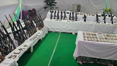 High-end weapons surrendered by Maoists in Telangana. (Express Photo)