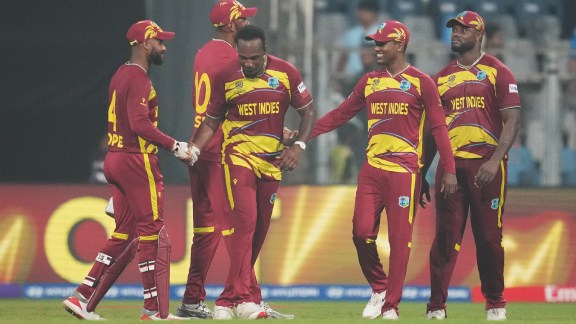 West Indies players celebrate after their win against Zimbabwe during the T20 World Cup cricket match in Mumbai. (AP Photo)