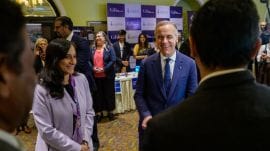 Canadian Minister of Foreign Affairs Anita Anand (L) with Prime Minister Mark Carney (R) at an evet in New Delhi