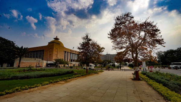 Gujarat Legislative assembly in Gandhinagar under an overcast sky leading to a sprinkle on Monday. (Express Photo by Bhupendra Rana)
