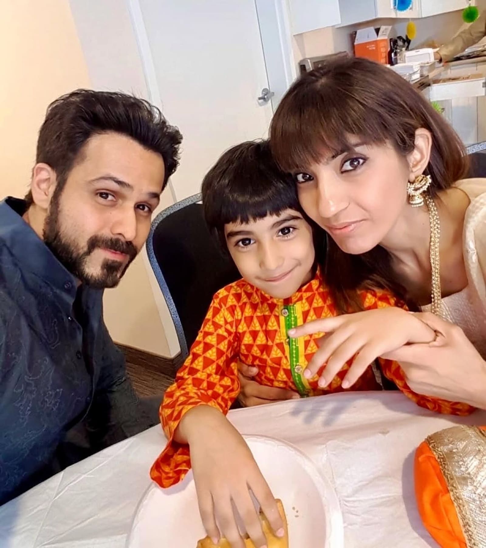 Emraan Hashmi with his wife and son