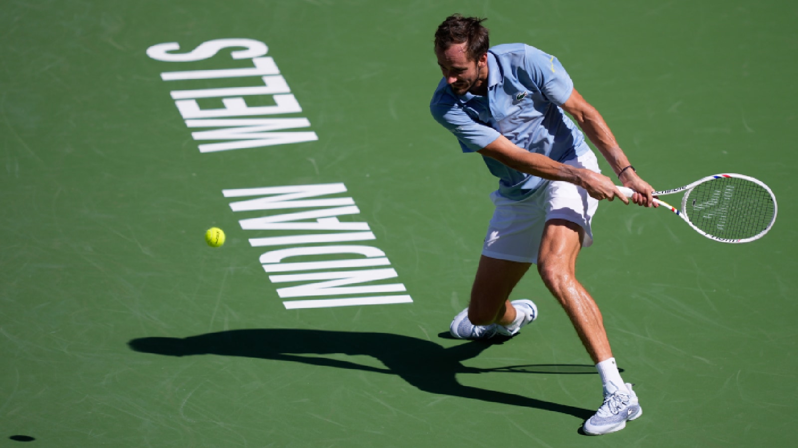 Daniil Medvedev, of Russia, returns a shot against Jannik Sinner, of Italy, during a final match at the BNP Paribas Open tennis tournament, Sunday, March 15, 2026, in Indian Wells, Calif. (AP Photo/Mark J. Terrill)