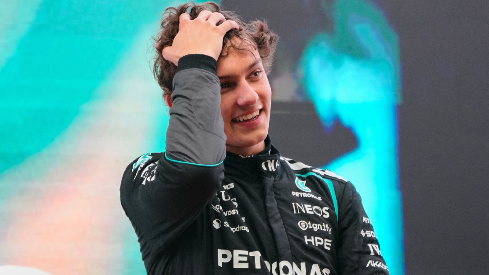 Race winner Mercedes driver Andrea Kimi Antonelli of Italy celebrates on the podium after the Chinese Formula One Grand Prix at the Shanghai International Circuit in Shanghai, China, Sunday, March 15, 2026. (AP Photo)