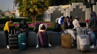 Passengers stranded by the closure of Dubai International Airport