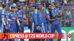 India's gamechangers against England in the T20 World Cup semi-final, Sanju Samson, Jasprit Bumrah and Axar Patel, lead the team off the ground at Mumbai's Wankhede Stadium. (Express photo by Narendra Vaskar)