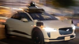A Waymo robotaxi navigates San Francisco, Sept. 20, 2023. In San Francisco, some passengers of autonomous taxis have experienced an unexpected hazard: being stuck in the vehicles when the cars are assaulted.