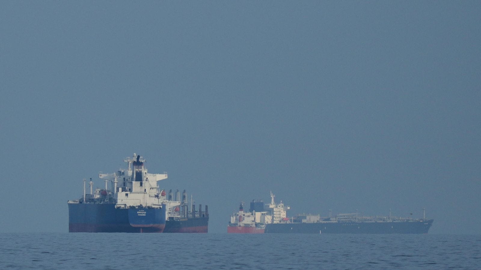 Oil tankers and cargo ships line up in the Strait of Hormuz as seen from Mina Al Fajer, United Arab Emirates, Wednesday, March 11, 2026. (AP Photo)