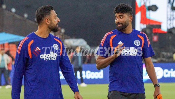 India's Varun Chakaravarthy and Mohammed Siraj during practice session ahead of T20 World Cup final in Ahmedabad. (Express photo by Bhupendra Rana)