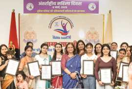 Members of 'Vaama Saarthi' felicitate women from police families in Lucknow.