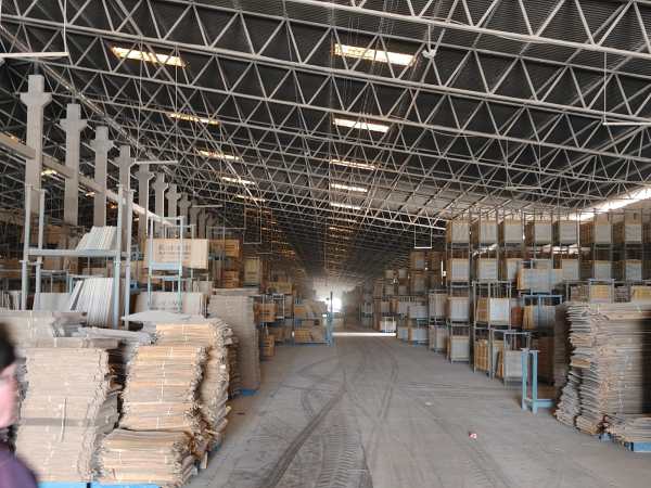 Warehouse of a tile unit in Morbi. (Express Photo)