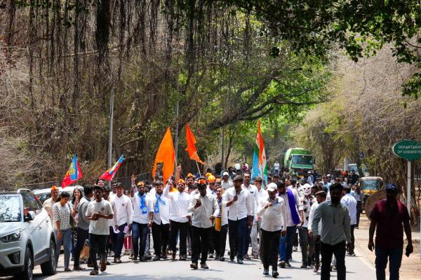 Around 50 protesters from organisations gathered outside the SPPU Main building to protest.