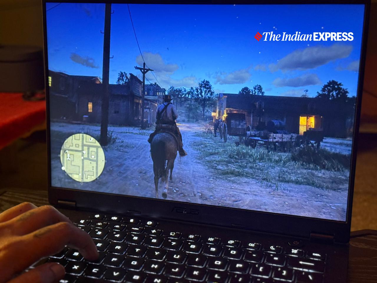 The Asus TUF Gaming A14 delivers smooth gameplay at 1600p, handling demanding titles with impressive performance for its size. (Image: Bijin Jose/The Indian Express)