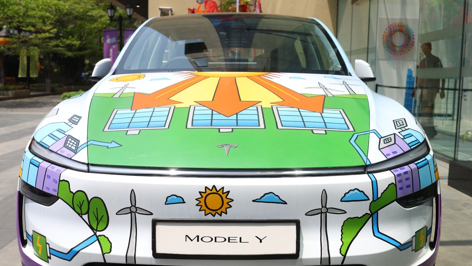 indianexpress.com - Arnav Chandrasekhar - A Tesla wrapped in art: Bengaluru exhibition reimagines future through renewables and AI