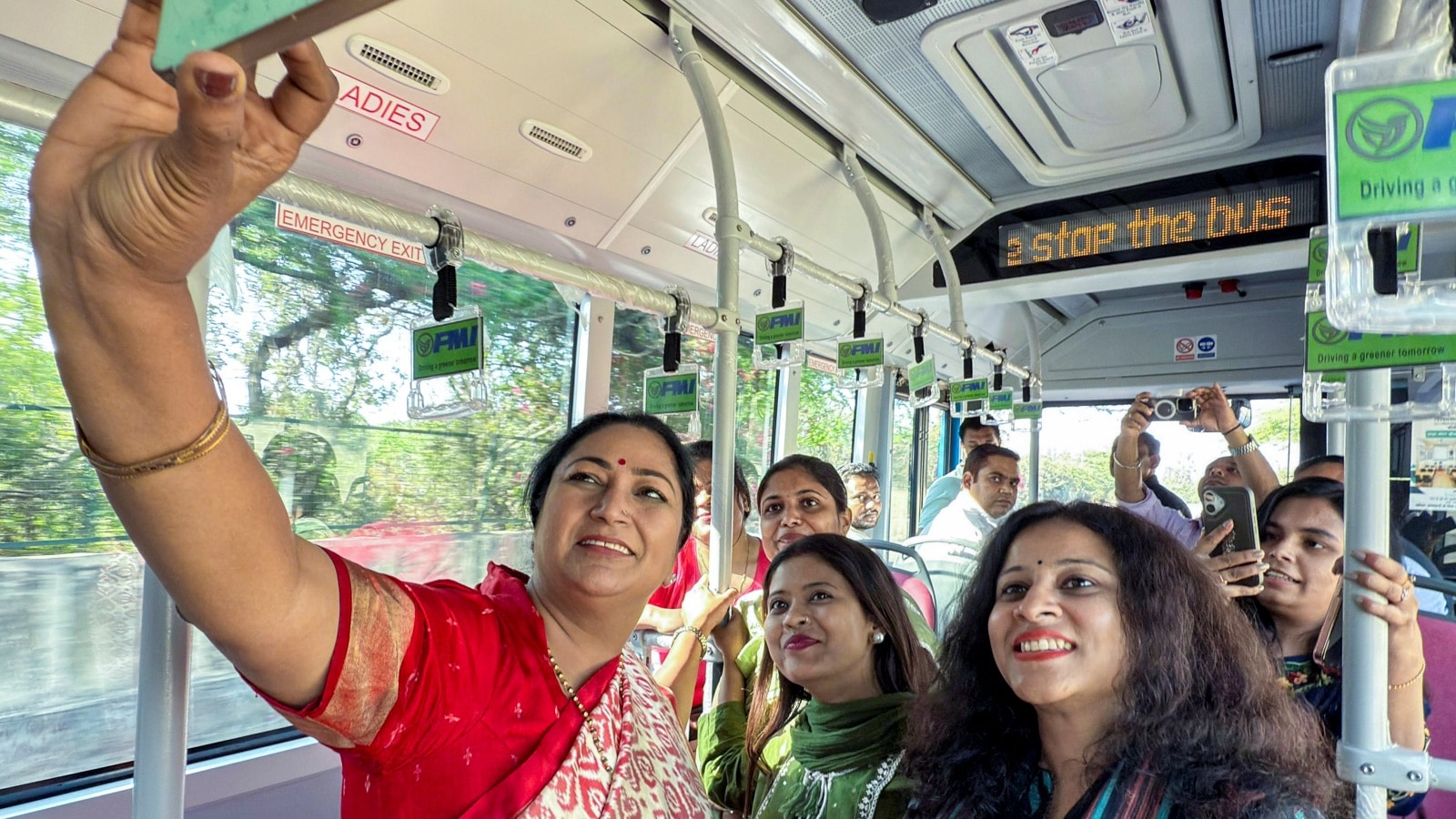 Delhi CM travels in DTC bus to take stock of implementation of Saheli Pink Smart Card