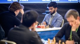 World champion D Gukesh contemplates his next move at the Prague International Chess Festival. (Photo: Petr Vrabec via Prague International Chess Festival)
