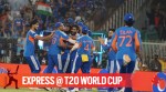 Indian cricket team players celebrate a catch against New Zealand in the T20 World Cup final at the Narendra Modi Stadium. (Express photo by Bhupendra Rana)