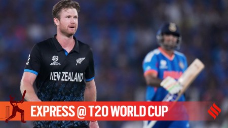New Zealand's Jimmy Neesham celebrates the wicket of India's captain Suryakumar Yadav, right, during the T20 World Cup cricket final match between India and New Zealand in Ahmedabad, India, Sunday, March 8, 2026. (AP Photo)