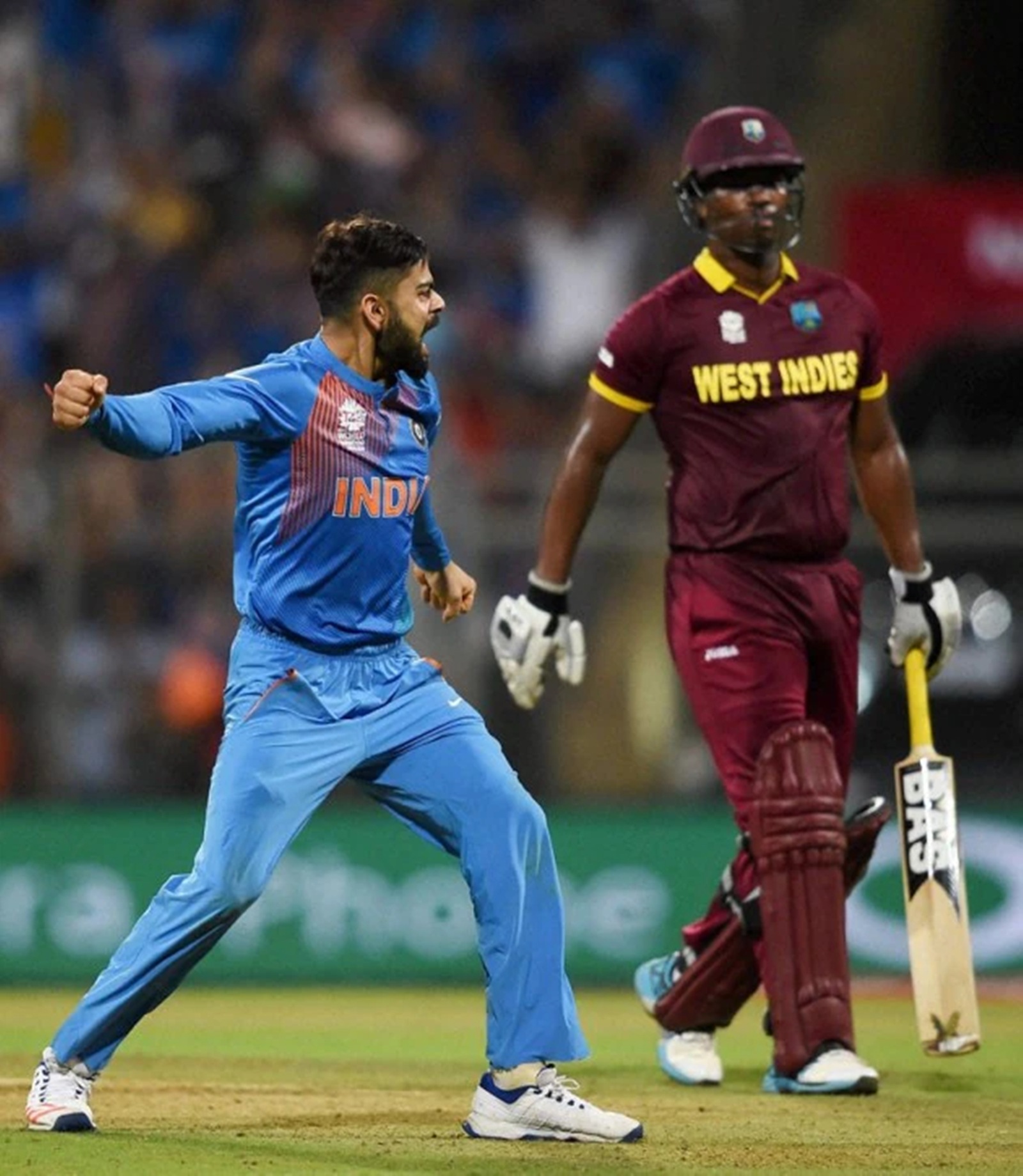 Kohli even chipped in with the ball, breaking a dangerous stand by dismissing Johnson Charles and briefly reviving India’s hopes in the chase. (Reuters Photo)