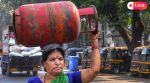 Mumbai: A woman carries a domestic LPG cylinder on her head amid shortage of LPG supply, in Mumbai, Thursday, March 12, 2026. (PTI Photo)(PTI03_12_2026_000160B)