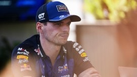 Red Bull driver Max Verstappen sits outside his team garage ahead of the Australian Formula 1 Grand Prix at Albert Park, in Melbourne, Australia, Thursday, March 5, 2026. (AP Photo)