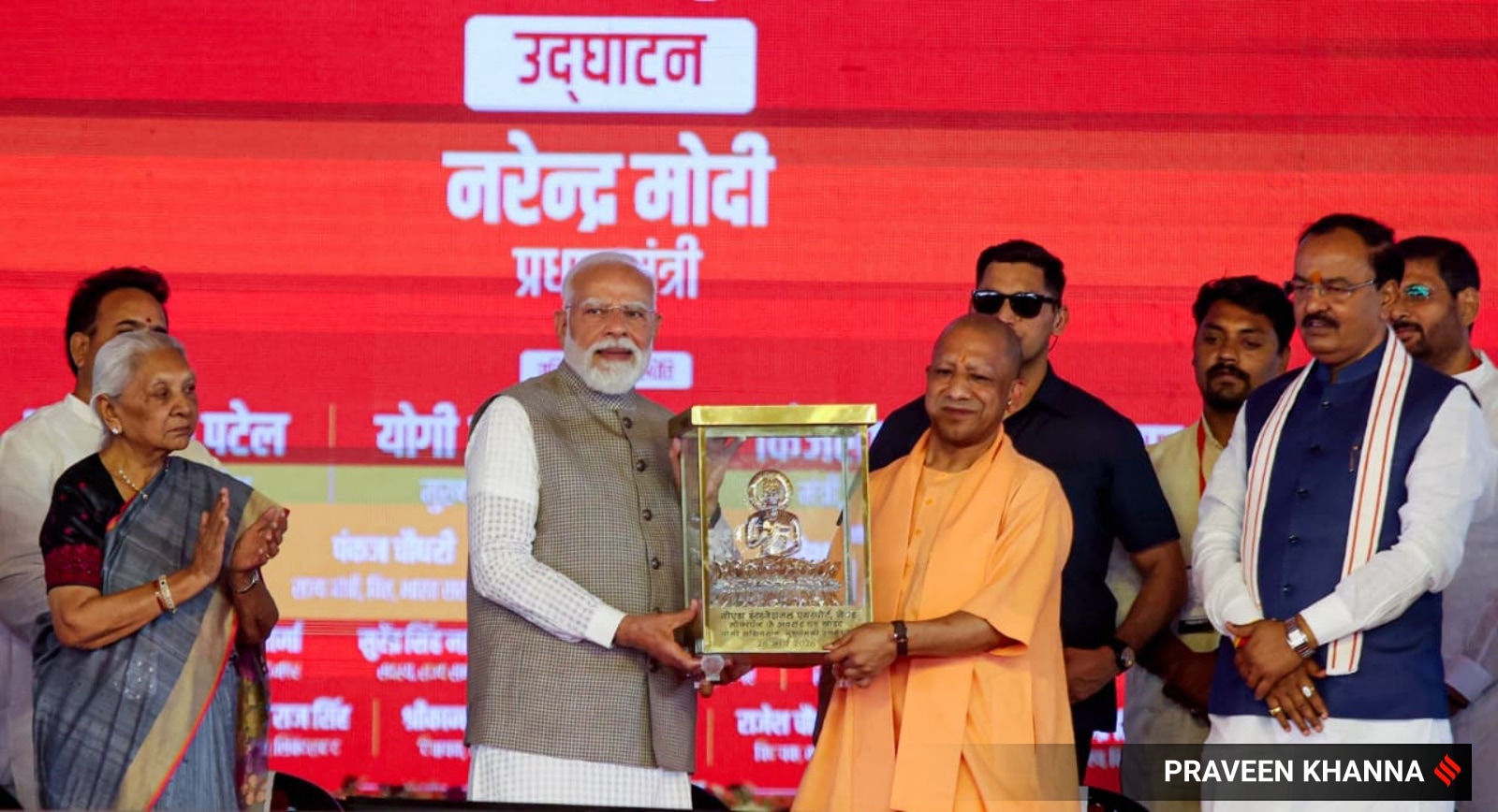 Prime Minister Narendra Modi being felicitated by Uttar Pradesh Chief Minister Yogi Adityanath during inauguration of the newly constructed Noida International Airport, in Jewar