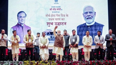 Modi hands over land rights to tea workers, Modi hands over land rights to Assam tea workers, Assam tea workers, Assam tea workers land rights, PM-KISAN scheme, Narendra Modi, Assam government, Indian express news, current affairs