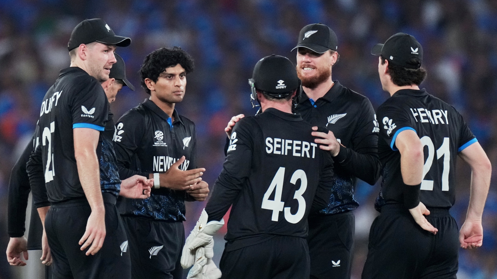 New Zealand's players celebrate the wicket of India's Abhishek Sharma during the T20 World Cup cricket final match between India and New Zealand in Ahmedabad, India, Sunday, March 8, 2026. (AP Photo)