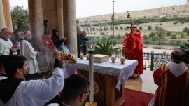 Cardinal Pierbattista Pizzaballa, the Latin Patriarch of Jerusalem, holds a prayer service to mark Palm Sunday in Jerusalem
