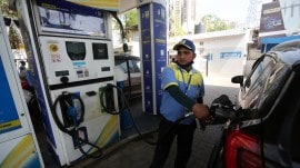 Govt slashes excise duty by Rs 10 but retail price remain same. Here’s what petrol pumps are saying