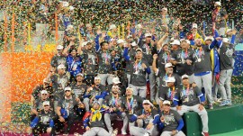 The Venezuela team celebrates after defeating the United States in the championship game of the World Baseball Classic, Tuesday, March 17, 2026, in Miami. (AP Photo)