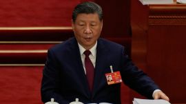 Chinese President Xi Jinping reacts during the opening session of the National People's Congress (NPC) in Beijing, Thursday, March 5, 2026. (AP Photo/Ng Han Guan)