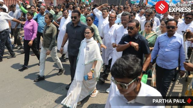 Amid slogans of support from party workers, she began a roadshow from her Kalighat residence