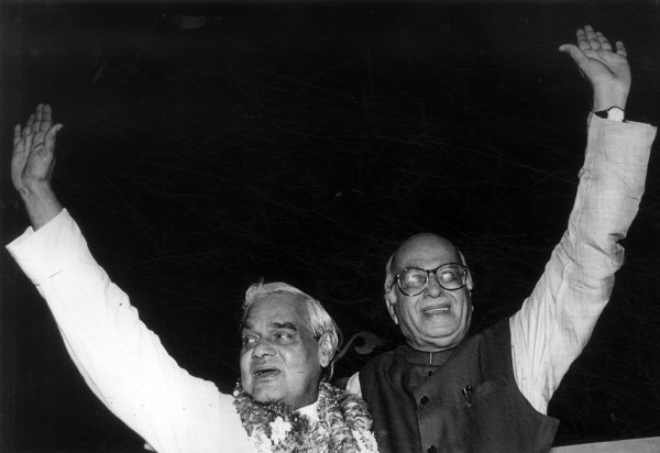 Bharatiya Janata Party leaders Atal Bihari Vajpayee and LK Advani wave to their supporters after winning the general election. (Express Archive/Arun Jete)
