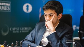 Javokhir Sindarov in action against China's Wei Yi at the 2026 Candidates chess tournament. (FIDE/Yoav Nis)