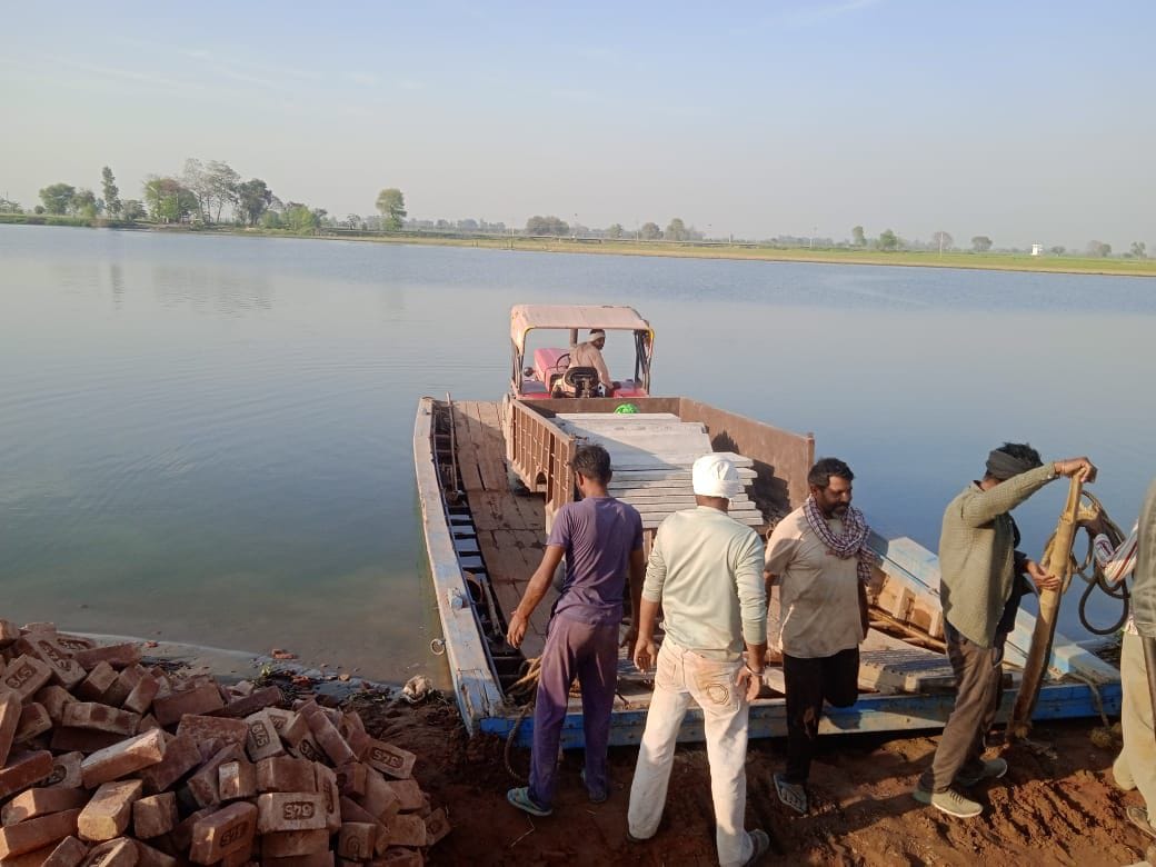 Ferrying bricks, cement on boats: Singapore organisation rebuilds homes in flood-hit village at Indo-Pak border