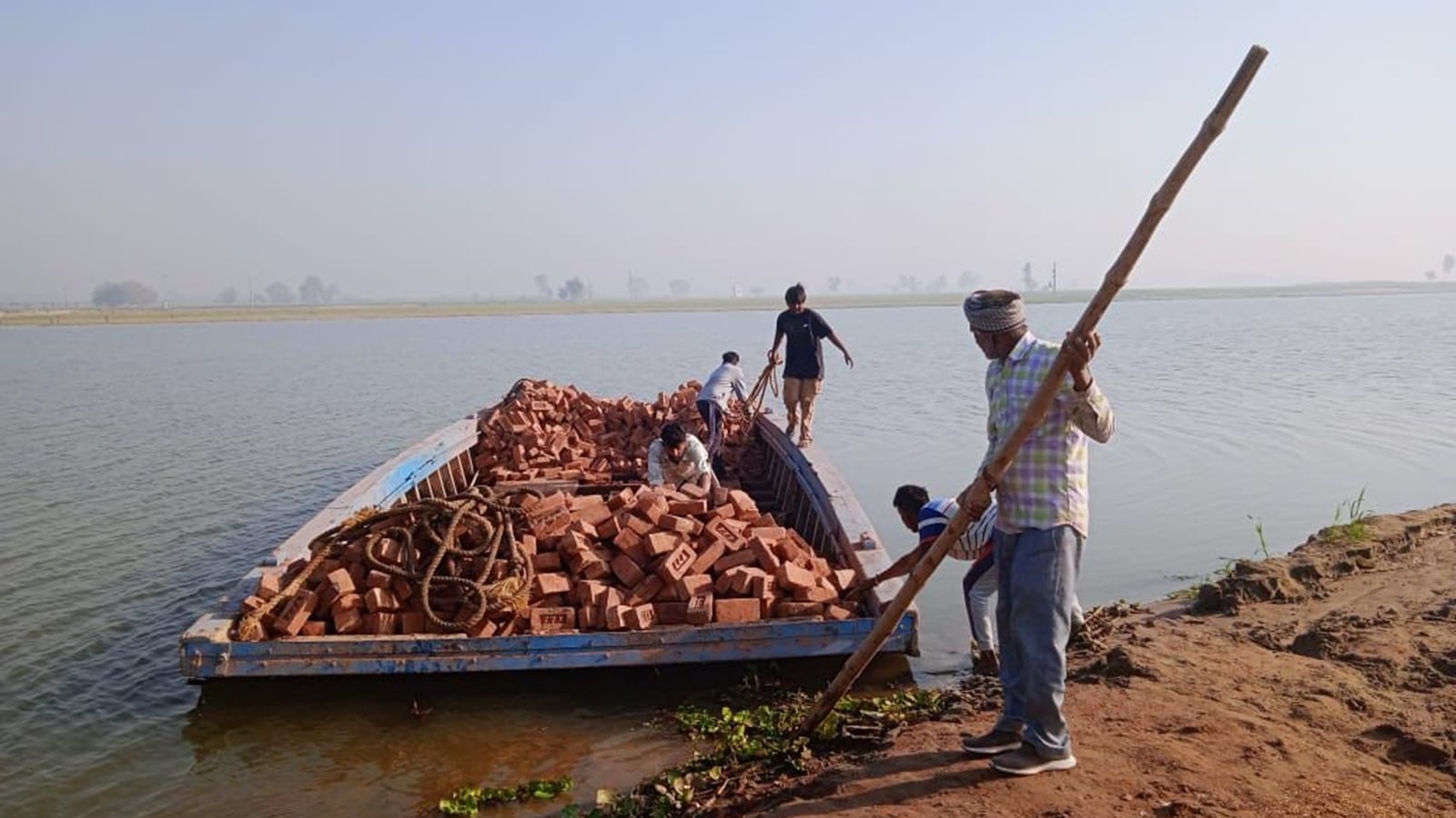 Ferrying bricks, cement on boats: Singapore organisation rebuilds homes in flood-hit village at Indo-Pak border