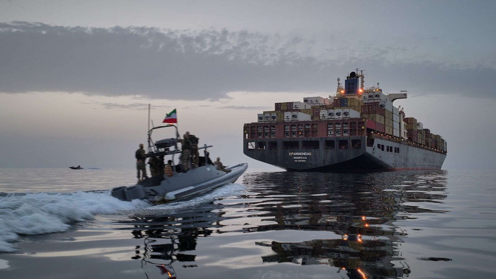 In this photo released by Tasnim News Agency, a Revolutionary Guard Navy (IRGC) speedboat approaches the cargo ship Epaminondas during what state media described as the seizure of one of two vessels accused of violations in the Strait of Hormuz. Iran (AP Photo)