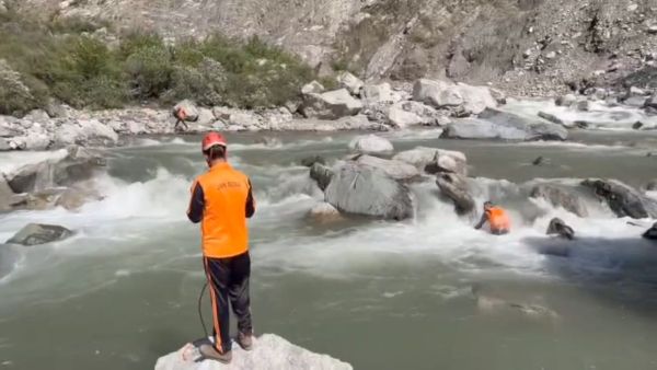 SDRF members looking for missing youth in Bisleri nullah. (Express Photo)