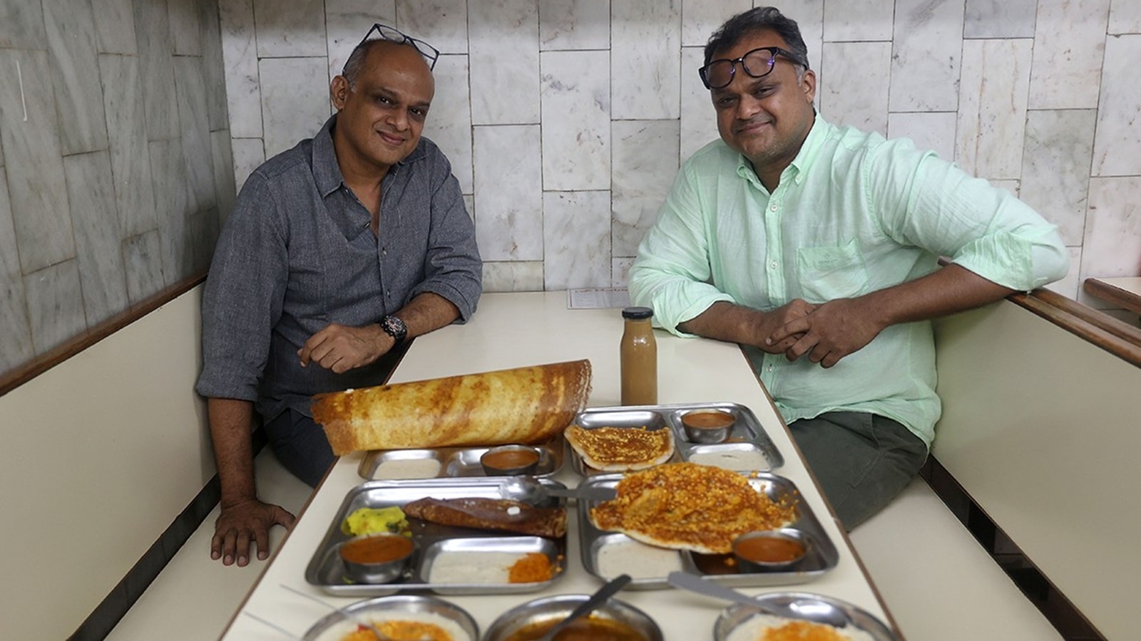 Jai Prakash and Devavrat Kamath, the third-generation custodian of Cafe Madras in Matunga, Mumbai (Express photo by Amit Chakravarty)