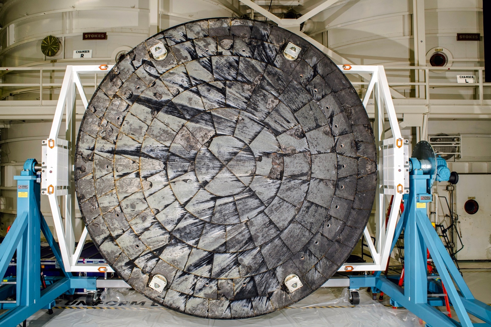 A photo provided by NASA shows the heat shield of the Orion spacecraft, which was removed after the conclusion of the Artemis I mission, at the Kennedy Space Center in Florida